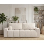 Nowoczesna sofa do salony obłe przeszycia na siedzisku Mavi